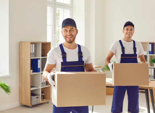 Image of our movers lifting boxes and offering our commercial moving services