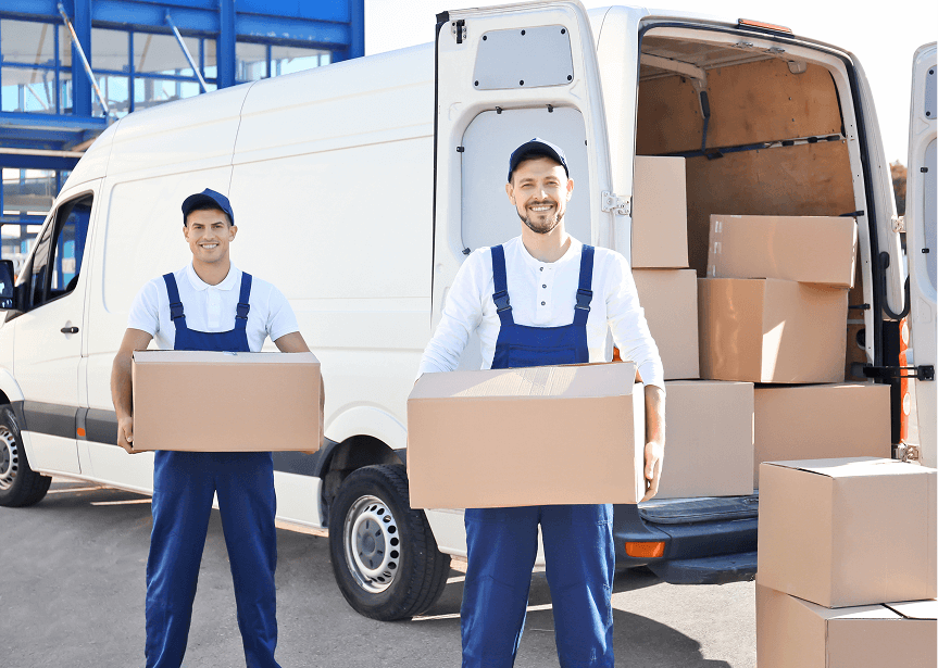 E-Logic movers packing a van with boxes