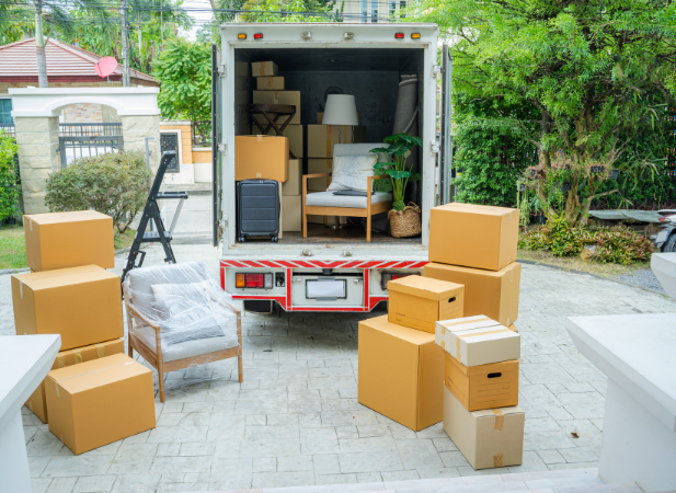 image of our apartment moving services in action featuring our truck and boxes