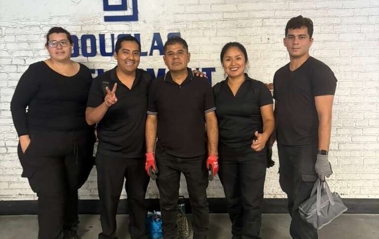Full-service movers wearing black by E-Logic Moving